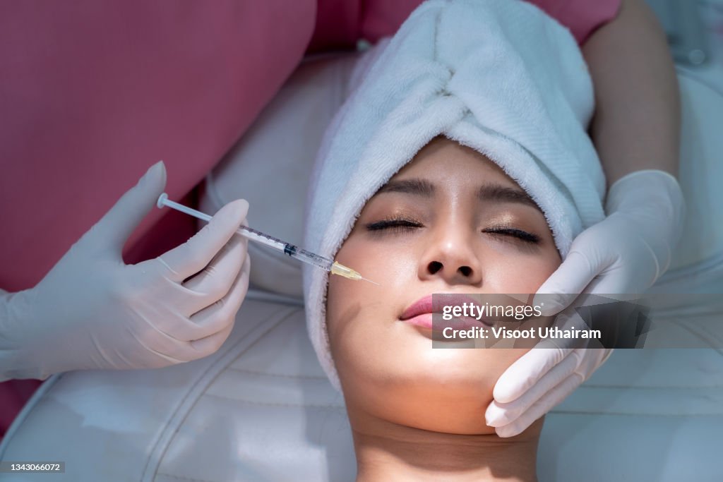 Beauty treatment with hyaluronic collagen injection,Young woman has a botox injections.