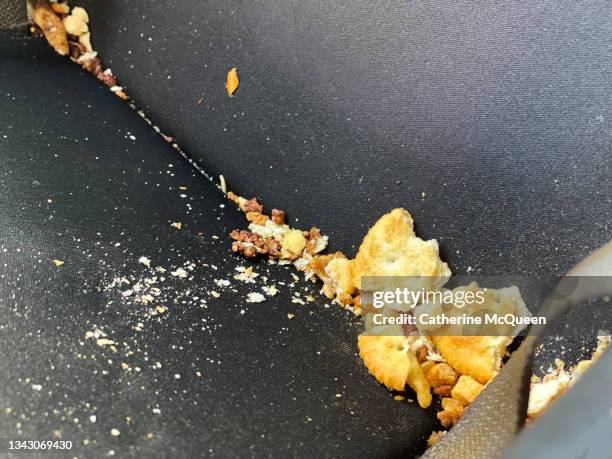 time to clean toddler’s car safety seat - krümel stock-fotos und bilder