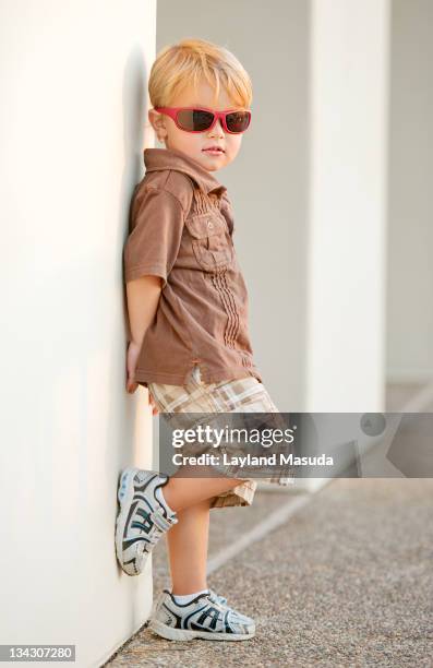 little boy wearing glasses - kid leaning stock pictures, royalty-free photos & images