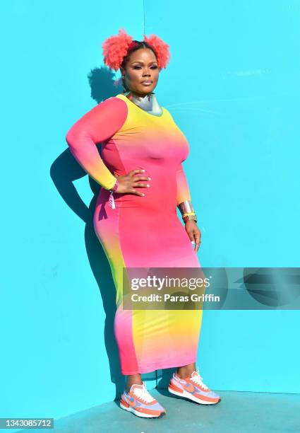 An attendee poses for a photo during day 2 of 2021 AfroPunk Atlanta at Atlantic Station Pinnacle on September 26, 2021 in Atlanta, Georgia.