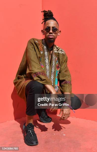 An attendee poses for a photo during day 2 of 2021 AfroPunk Atlanta at Atlantic Station Pinnacle on September 26, 2021 in Atlanta, Georgia.