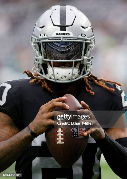 Cornerback Damon Arnette of the Las Vegas Raiders warms up before a game against the Miami Dolphins at Allegiant Stadium on September 26, 2021 in Las...