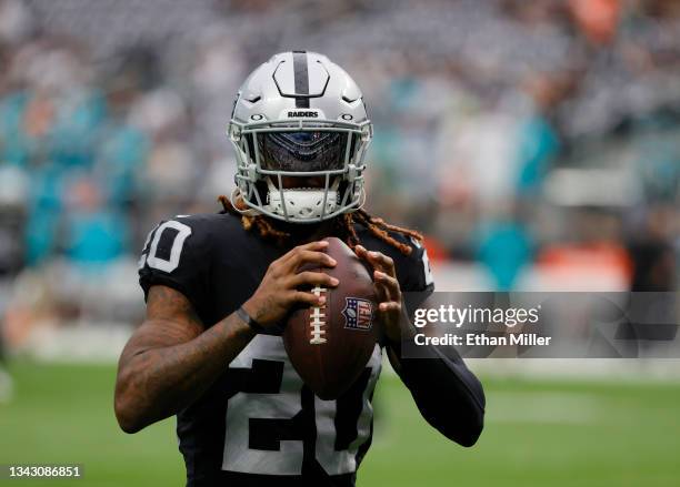 Cornerback Damon Arnette of the Las Vegas Raiders warms up before a game against the Miami Dolphins at Allegiant Stadium on September 26, 2021 in Las...