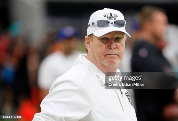 Las Vegas Raiders owner and managing general partner Mark Davis watches his team warm up before a game against the Miami Dolphins at Allegiant...