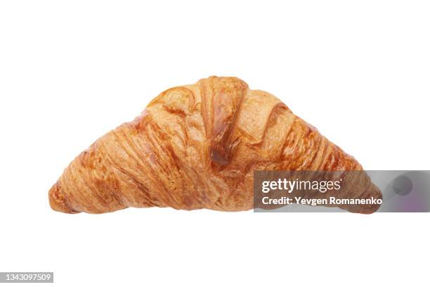 fresh crusty croissant isolated on white background - medias lunas fotografías e imágenes de stock