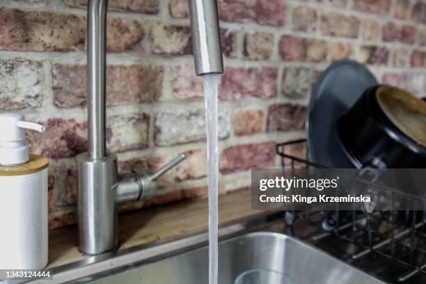 tap water - world water day stock pictures, royalty-free photos & images