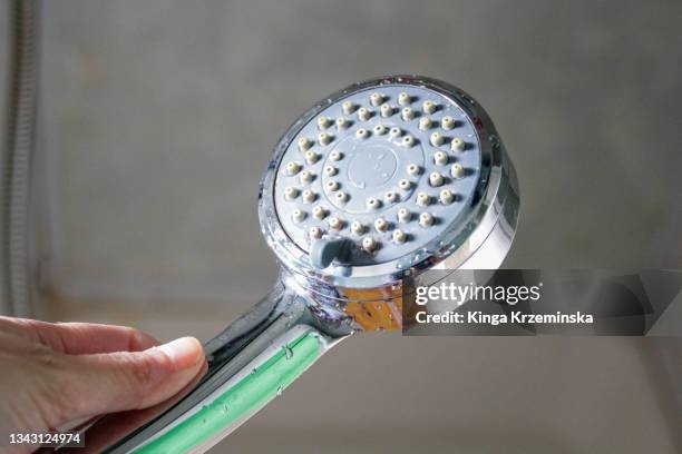 shower - shower tap stock pictures, royalty-free photos & images