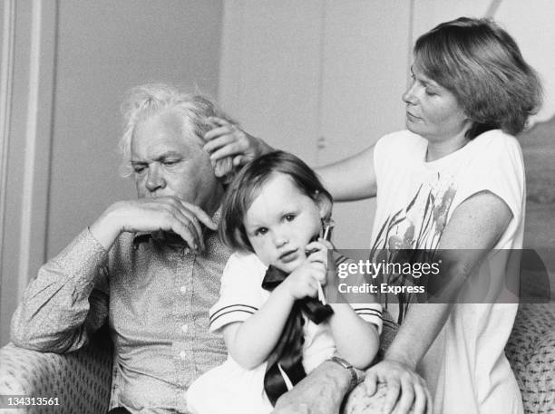 English film director Ken Russell with Vivian Jolly and their daughter Molly, circa 1981. Russell and Jolly married in 1983. Molly Russell later...