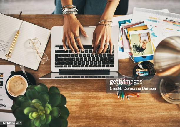 shot of an unrecognisable businesswoman using a laptop while working remotely - editing room stock pictures, royalty-free photos & images