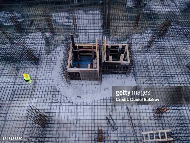 aerial view of construction site foundations, engineer working. - building foundations stockfoto's en -beelden