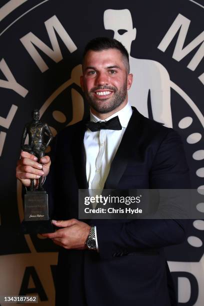 James Tedesco of the Sydney Roosters poses after winning Captain of the Year during the NRL 2021 Dally M Awards at the Howard Smith Wharves on...