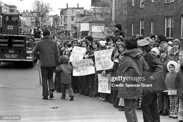 Anti-busing protestors line a street to demonstrate against forced busing of students into formerly all-white South Boston schools, September 1974.