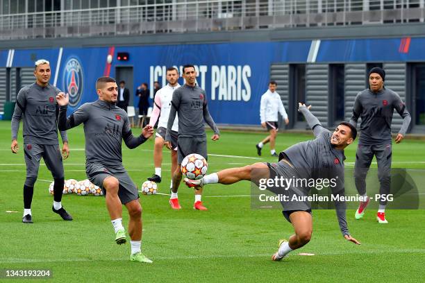 Leandro Paredes controls the ball during a Paris Saint-Germain training session at Ooredoo Center on September 27, 2021 in Paris, France.