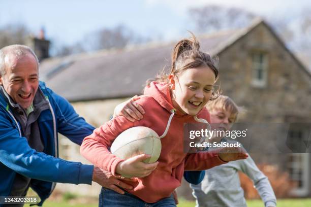 determined to win the game - family sports centre laughing stock pictures, royalty-free photos & images