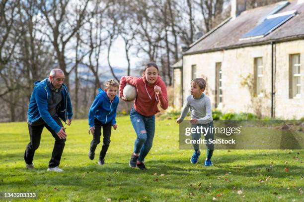 i've got the ball! - kids rugby stock pictures, royalty-free photos & images