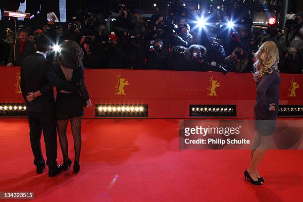 Director Jaume Collet-Serra with guest and German actress Petra Schmidt-Schaller attend the 'Unknown' Premiere during day nine of the 61st Berlin...