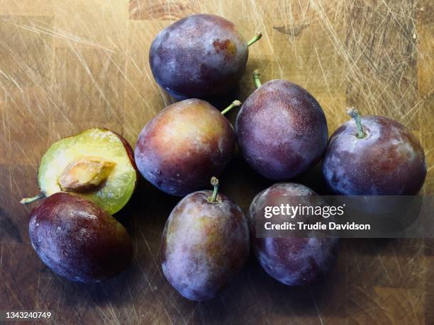 preparing plums - plum stock pictures, royalty-free photos & images