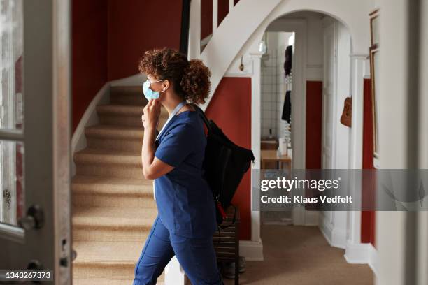 caregiver going for work during covid-19 - nurse leaving stock pictures, royalty-free photos & images