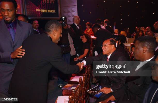 Bob Johnson and Louis Farrakhan, before the BET Walk of Fame show honoring Stevie Wonder.