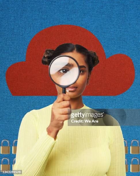 collage of young woman holding magnifying glass over eye with cloud computing symbol in background - meio de informação imagens e fotografias de stock