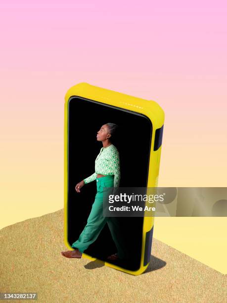 woman walking out of mobile phone into nature - detox bildbanksfoton och bilder