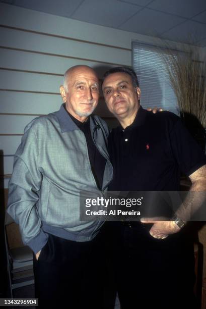 Actors Dominic Chianese and Vincent Curatola appear backstage when Members of the cast of "The Sopranos" join the rock group Chicago backstage and...