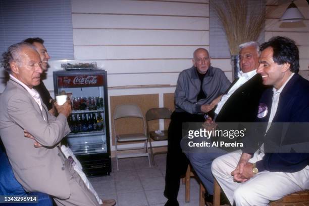 Actors Al Sapienza and Dominic Chianese speak with promoter Ron Delsner when Members of the cast of "The Sopranos" join the rock group Chicago...
