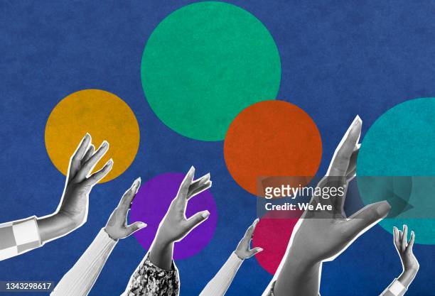collage of hands reaching up with colourful dots in background - fotomontaggio foto e immagini stock