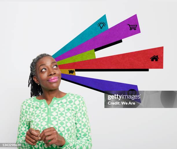 portrait of a mature woman with financial planning graphics surrounding her - cosmetics isolated stock pictures, royalty-free photos & images