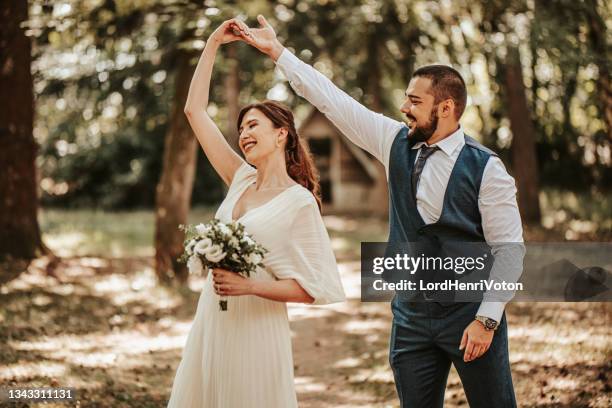 wedding couple dancing - fun lovers unite stock pictures, royalty-free photos & images