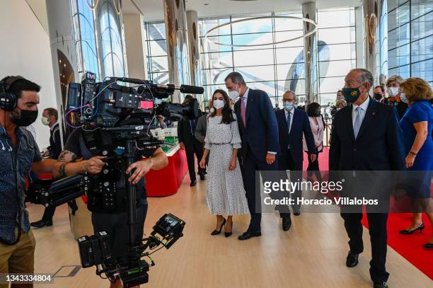 Mask-clad King of Spain Felipe VI and Queen Letizia Ortiz tour the premises with Portuguese President Marcelo Rebelo de Sousa during the inauguration...