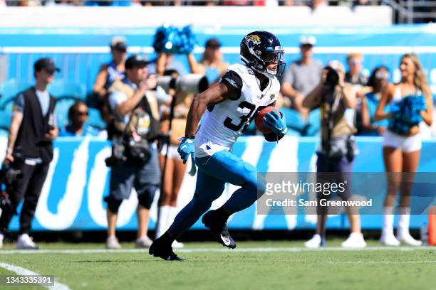 Jamal Agnew of the Jacksonville Jaguars runs for yardage during the game against the Arizona Cardinals at TIAA Bank Field on September 26, 2021 in...
