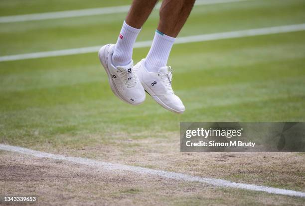 Roger Federer of Switzerland in action during the Men's Singles Quarter Final against Hubert Hurkacz of Poland at The Wimbledon Lawn Tennis...