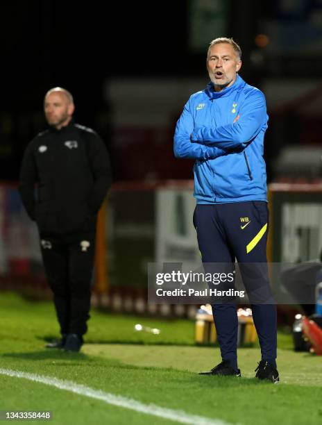 Wayne Burnett, Manager of Tottenham Hotspur U23s reacts during the Premier League 2 match between Tottenham Hotspur U23 and Derby County U23 at The...