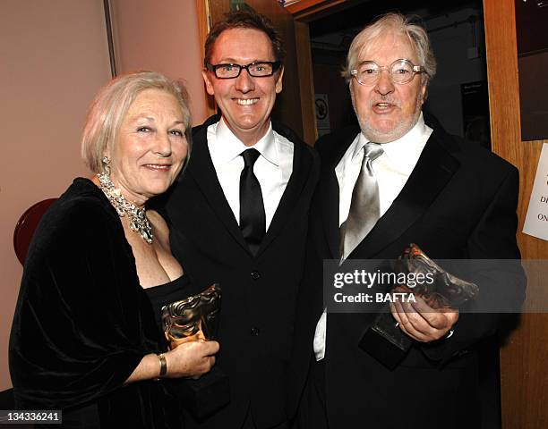 Jennifer Williams, Geoffrey Kirkland and Jim Clay, winners of Best Production Design Award for"Children of Men"