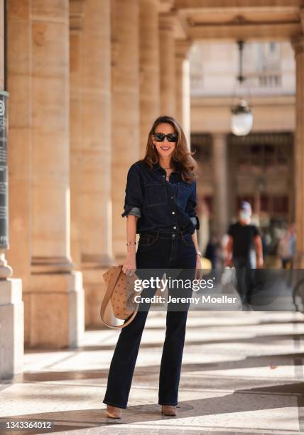 Alexandra Lapp wearing complete Comma look and Fendi First beige bag on September 18, 2021 in Dusseldorf, Germany.