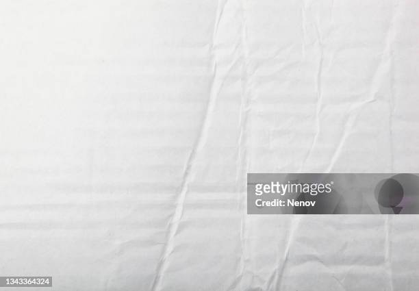 texture of crumpled white paper - cardboard stock-fotos und bilder