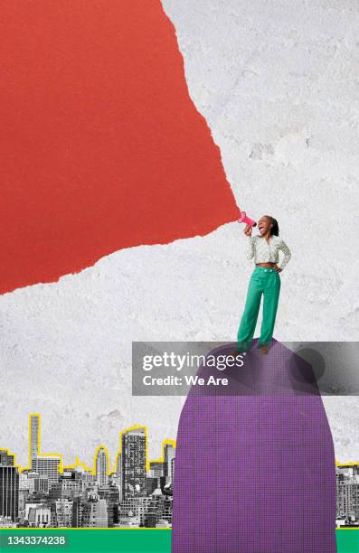 woman with megaphone on top of mountain - black top stock pictures, royalty-free photos & images