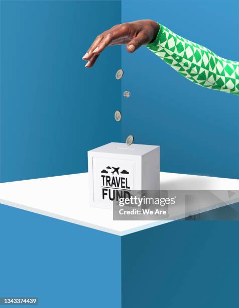 saving for travel - saving up for a rainy day stock pictures, royalty-free photos & images