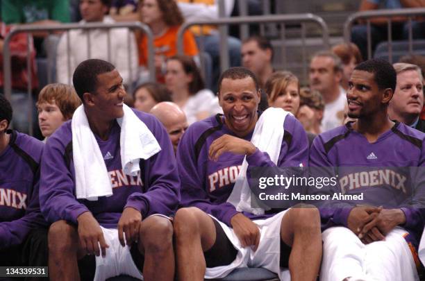 Raja Bell, Shawn Marion and Kurt Thomas of the Phoenix Suns share a joke from the bench during the NBA Europe Live Tour presented by EA Sports on...