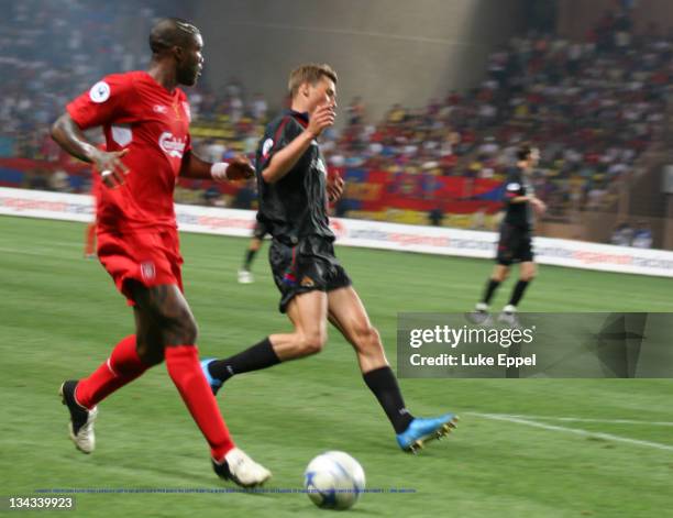 Liverpool's Djibrill Cisse bursts down Liverpool's right to set up his teams third goal in the UEFA Super Cup at the Stade Louis II, in Monaco, on...