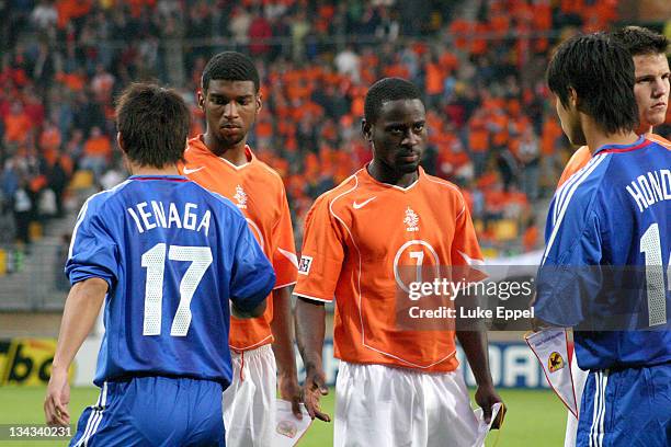 Quincy Owusu Abeyie gives the opposition a stern look in as both teams prepare to kick-off at the Parkstad Limburg Stadium in Kerkrade, Netherlands.