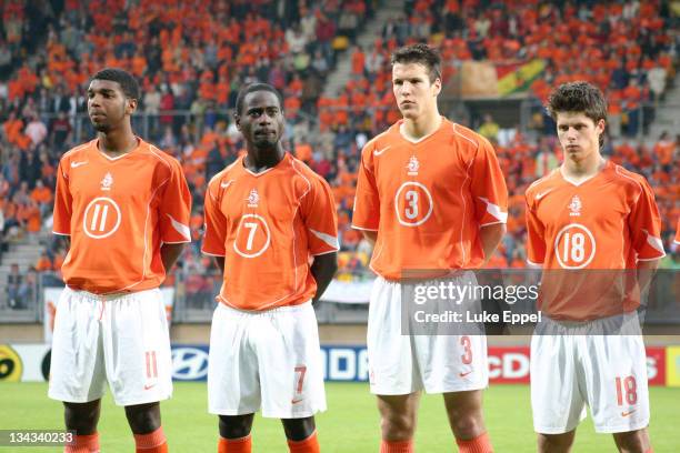 The team stand while the Dutch national anthem is played at the Parkstad Limburg Stadium in Kerkrade, Netherlands. From left to right: Ryan Babel,...