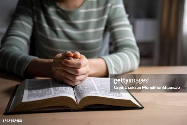 women reading the holy bible,reading a book. - religiös text bildbanksfoton och bilder