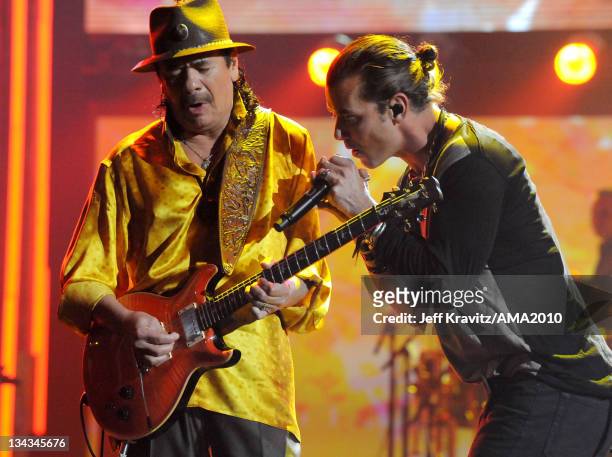 Musician Carlos Santana and singer Gavin Rossdale perform onstage at the 2010 American Music Awards at Nokia Theatre L.A. Live on November 21, 2010...