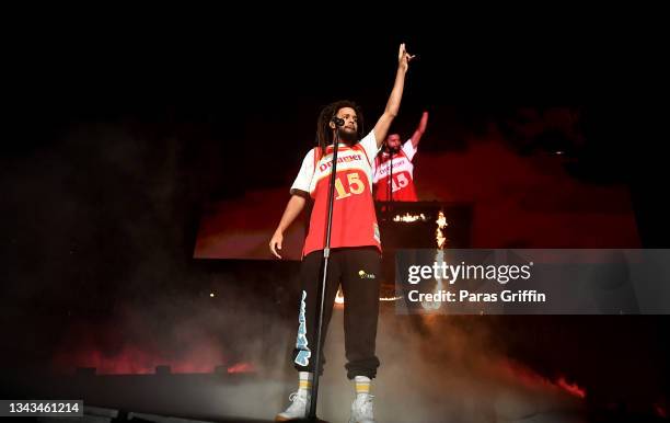 Rapper J. Cole performs onstage during his "The Off-Season" tour at State Farm Arena on September 27, 2021 in Atlanta, Georgia.