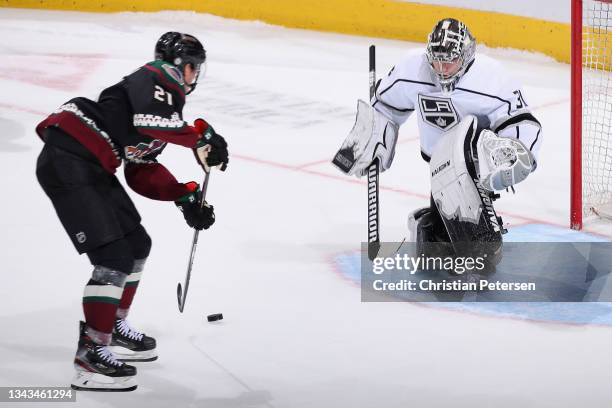 Goaltender Matt Villalta the Los Angeles Kings challenges Loui Eriksson of the Arizona Coyotes in a shootout during the preseason NHL game at Gila...