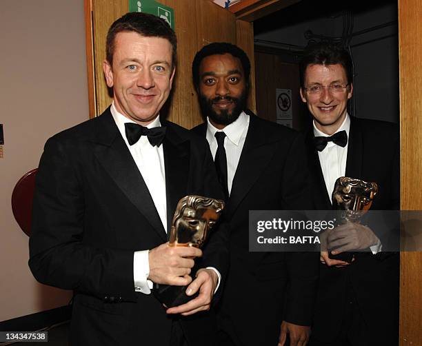 Peter Morgan and Jeremy Brock, winners of the Best Adapted Screenplay award for "The Last King of Scootland" and Chiwitel Ejiofor