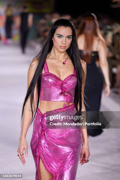 Dua Lipa walks the runway at the Versace fashion show Spring Summer 2022 on September 24, 2021 in Milan, Italy.