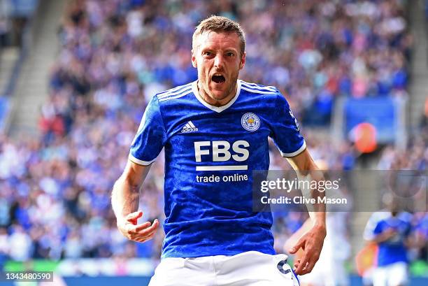 Jamie Vardy of Leicester City celebrates after scoring their team's first goal during the Premier League match between Leicester City and Burnley at...